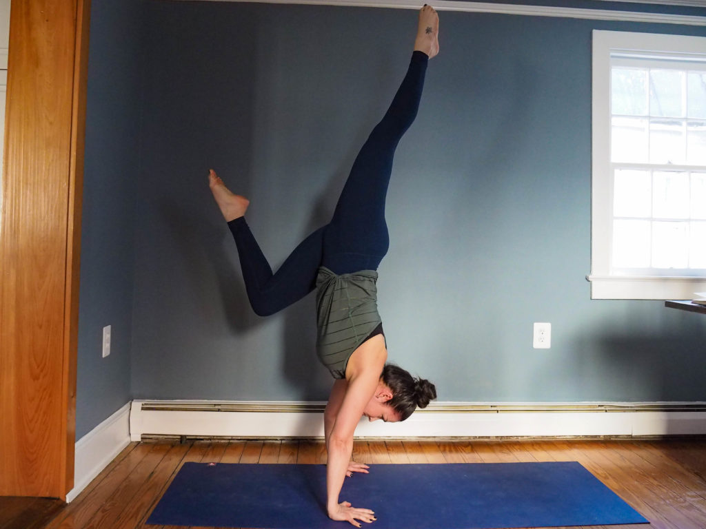Handstand near the wall yoga strengthening drill