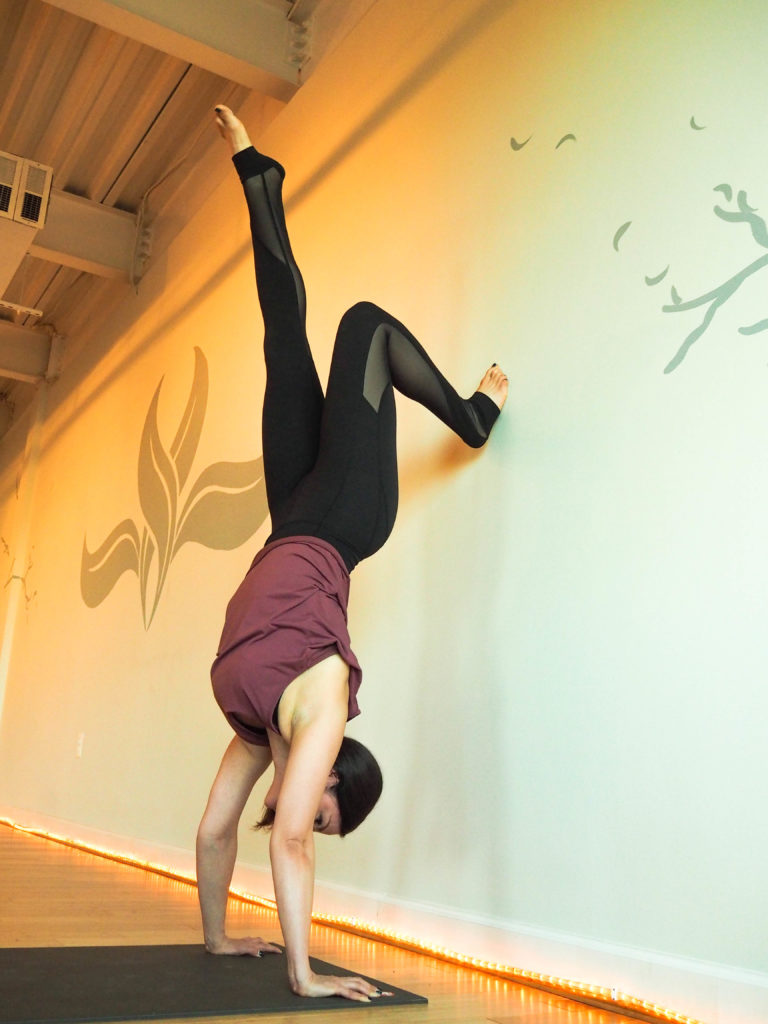 handstand hold at wall yoga strengthening drill