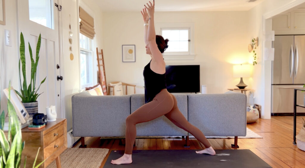 Picture of woman practicing yoga in living room